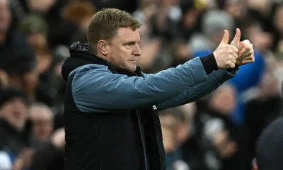 Eddie Howe gestures on the touchline during a Newcastle United match.