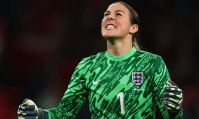 Eni Aluko speaking during a football event, supporting Mary Earps amid book controversy.