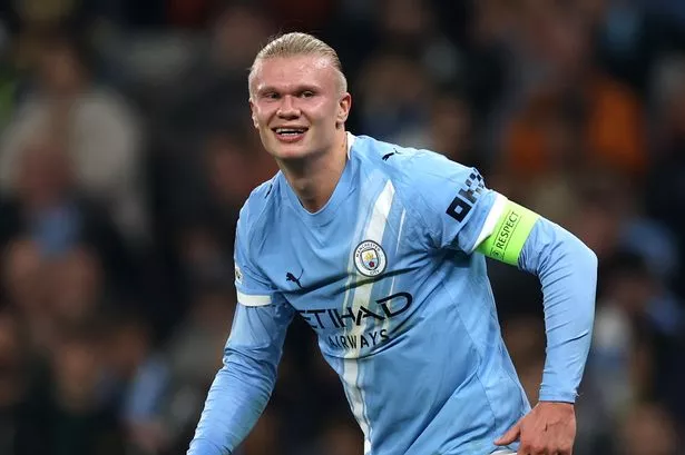 Erling Haaland celebrating after scoring for Manchester City against Borussia Dortmund in the UEFA Champions League