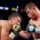 Gennady Golovkin throwing a left hook at Canelo Alvarez during their Las Vegas fight.