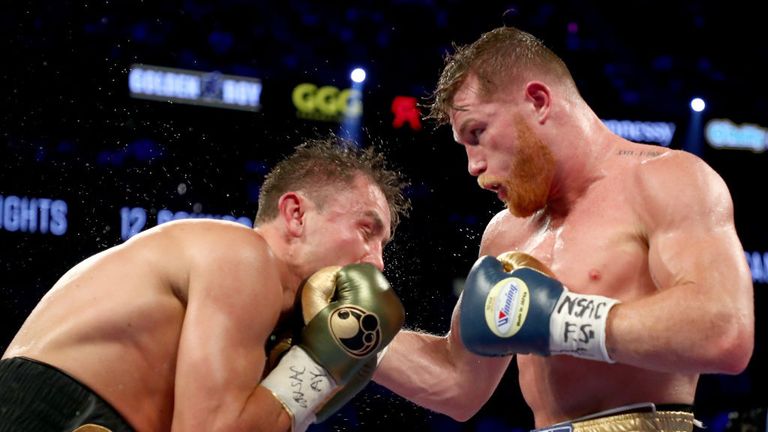 Gennady Golovkin throwing a left hook at Canelo Alvarez during their Las Vegas fight.
