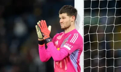Illan Meslier looking dejected on the Leeds United bench during matchday.