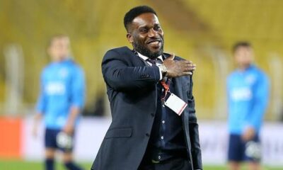 Jay-Jay Okocha speaking during a football event in Nigeria.