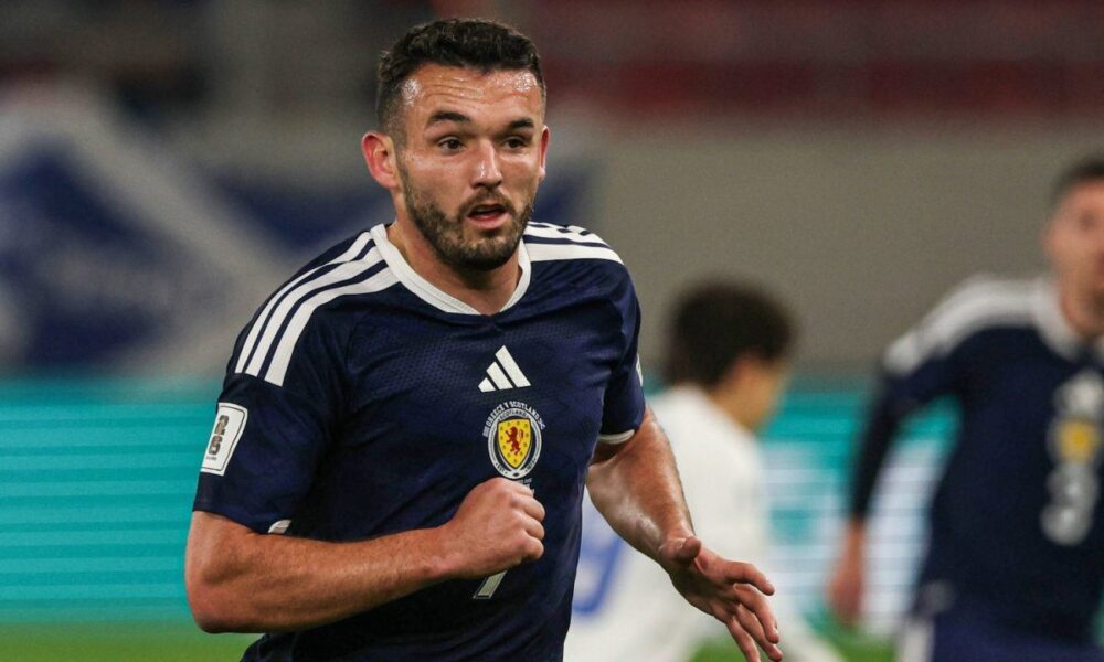 John McGinn celebrating during a Scotland match in the World Cup qualifiers