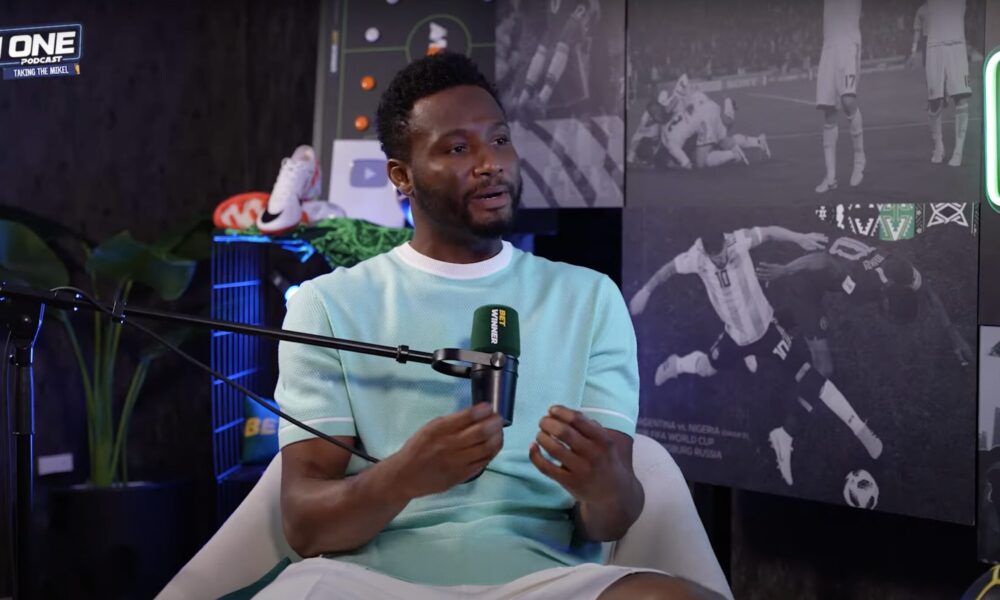 John Mikel Obi speaking passionately during a podcast recording.