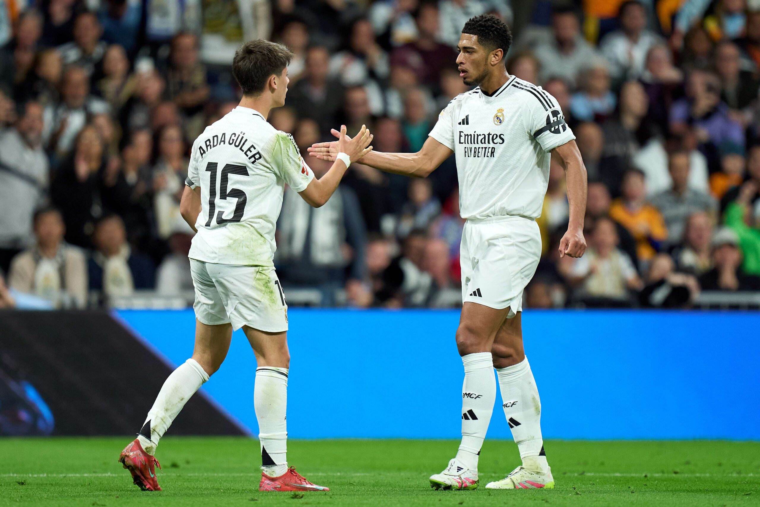 Jude Bellingham and Arda Guler celebrating during a Real Madrid match