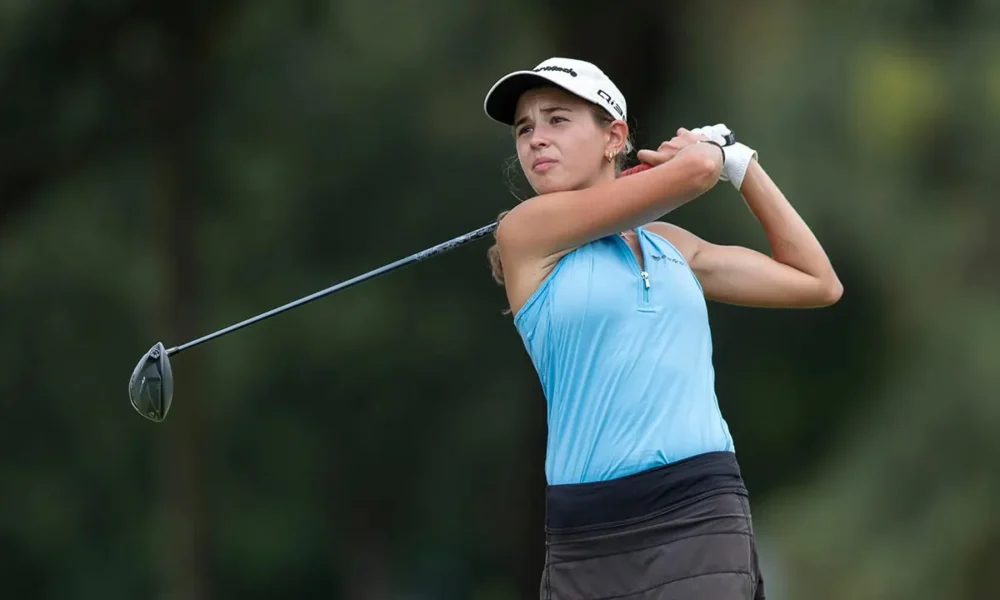 Kai Trump Taking A Swing During Her LPGA Debut At The Annika Tournament
