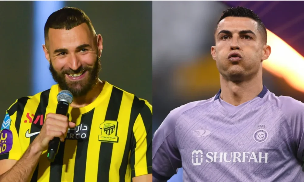 Karim Benzema and Cristiano Ronaldo greeting during a Saudi Pro League match