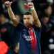 Kylian Mbappe celebrating during a PSG match before his exit to Real Madrid