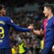 Lamine Yamal and Robert Lewandowski celebrating a goal together for Barcelona during a La Liga match.