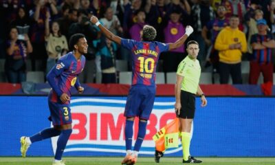 Lamine Yamal celebrates after scoring for Barcelona against Elche in La Liga