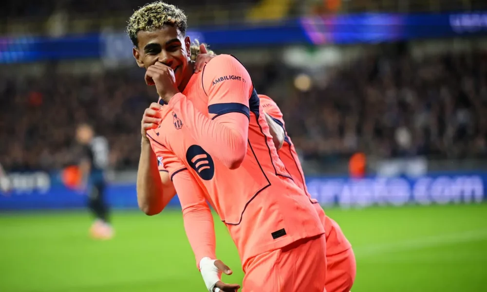 Lamine Yamal celebrating with Barcelona badge ahead of Camp Nou return