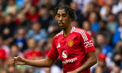 Leny Yoro applauds during a Manchester United match under Ruben Amorim