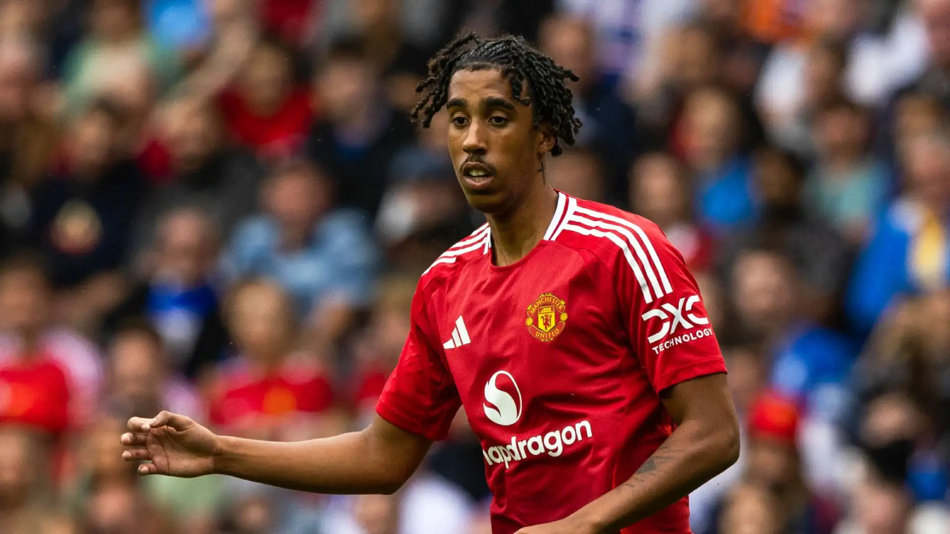 Leny Yoro applauds during a Manchester United match under Ruben Amorim