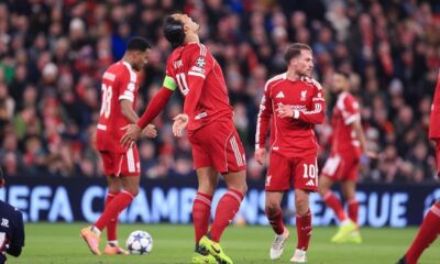 Liverpool players looking dejected after conceding against PSV in the Champions League