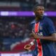Ousmane Dembele celebrating a goal for PSG amid injury concerns ahead of Bayern Munich clash