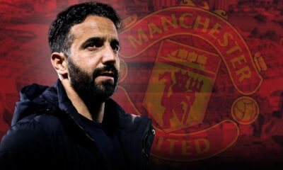 Ruben Amorim giving tactical instructions to Manchester United players during a team meeting.