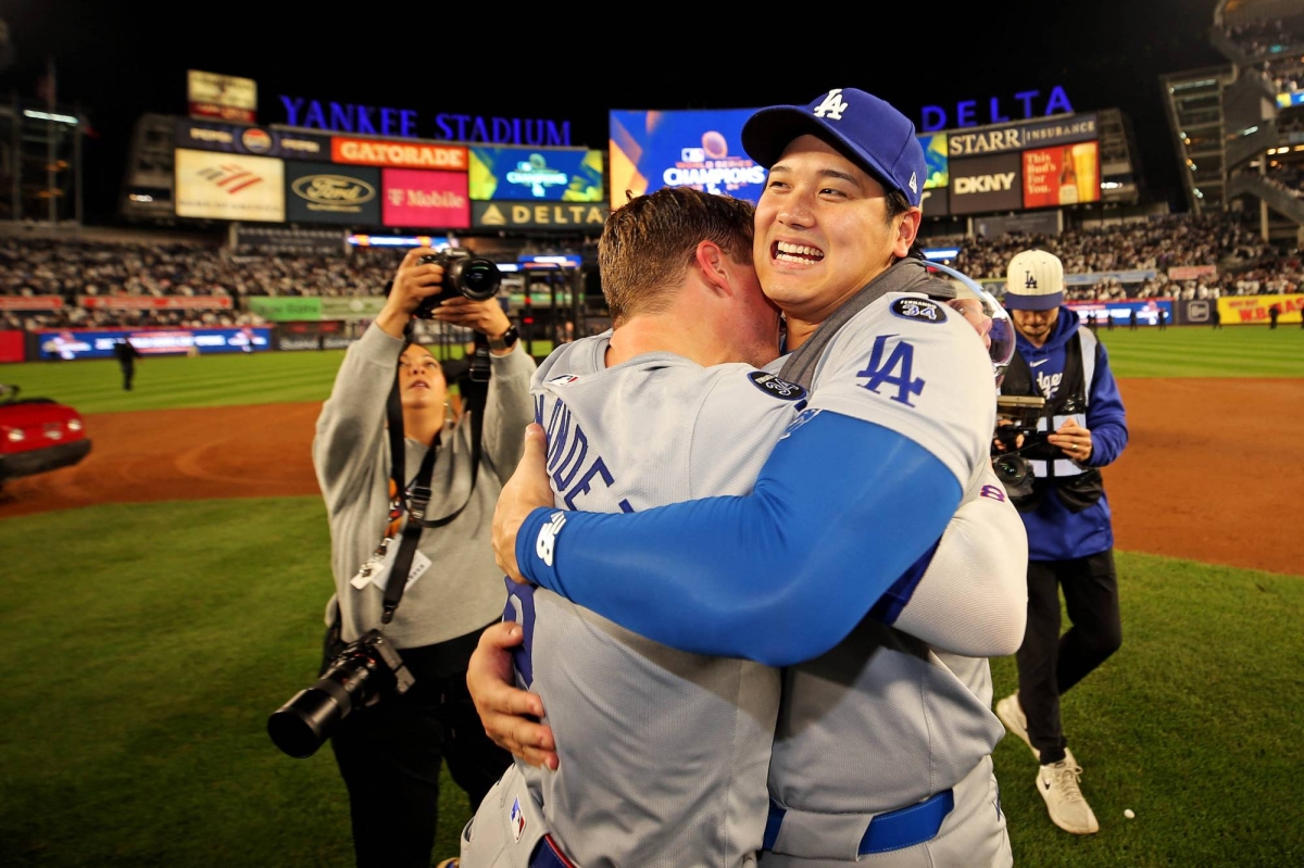 Shohei Ohtani celebrating Dodgers’ World Series win with teammates