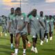 Super Eagles players during training session in Nigeria team kits.