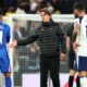 Tottenham players walking off the pitch disappointed after home defeat to Chelsea