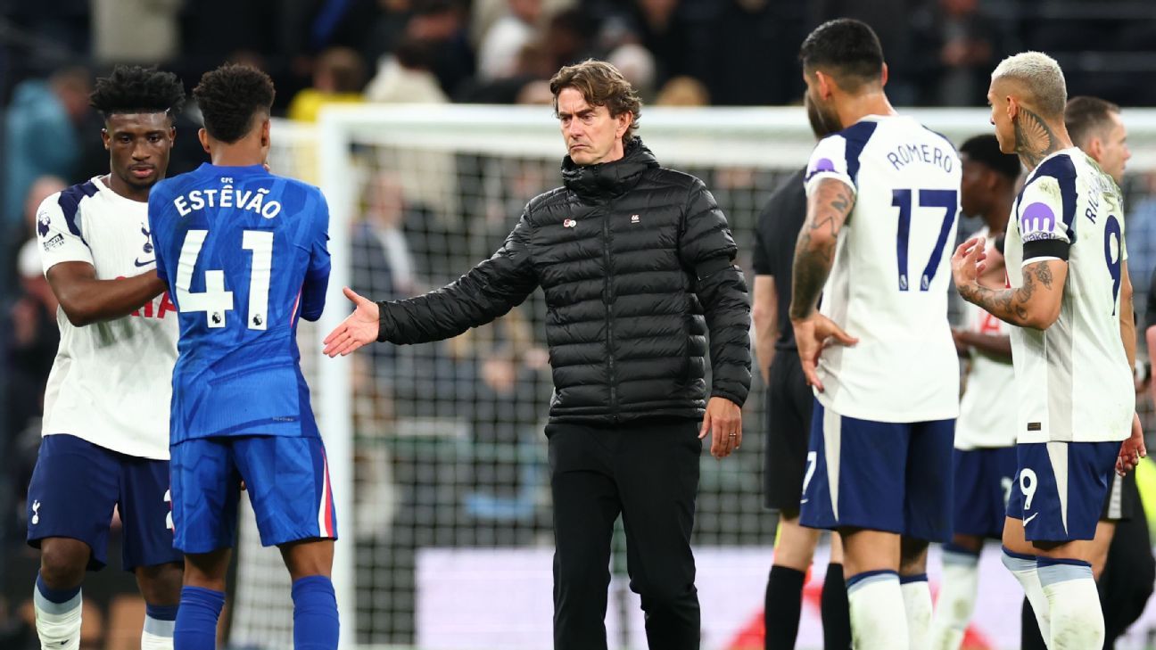 Tottenham players walking off the pitch disappointed after home defeat to Chelsea