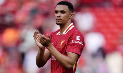 Trent Alexander-Arnold waves to fans after joining Real Madrid from Liverpool