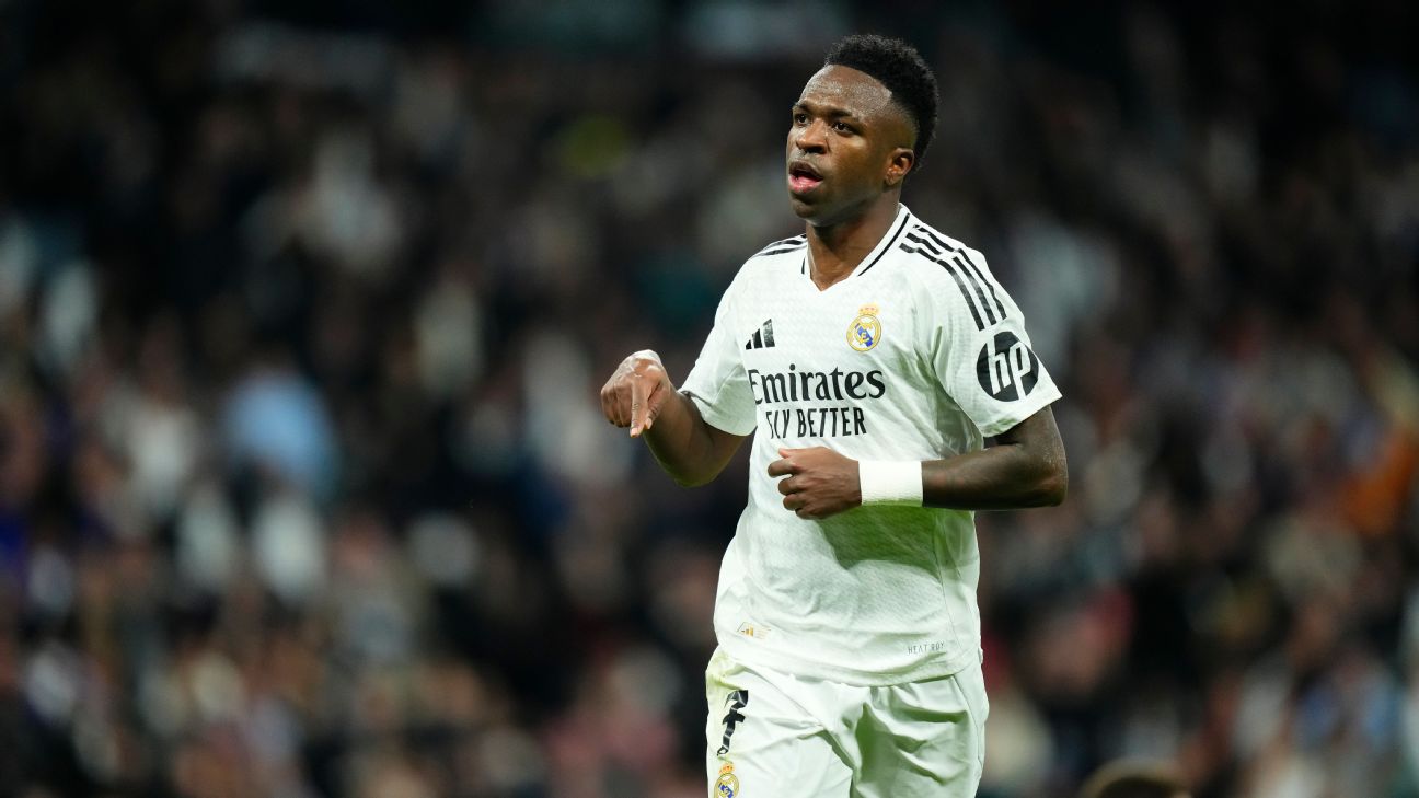 Vinicius Jr celebrating a goal for Real Madrid amid contract negotiations