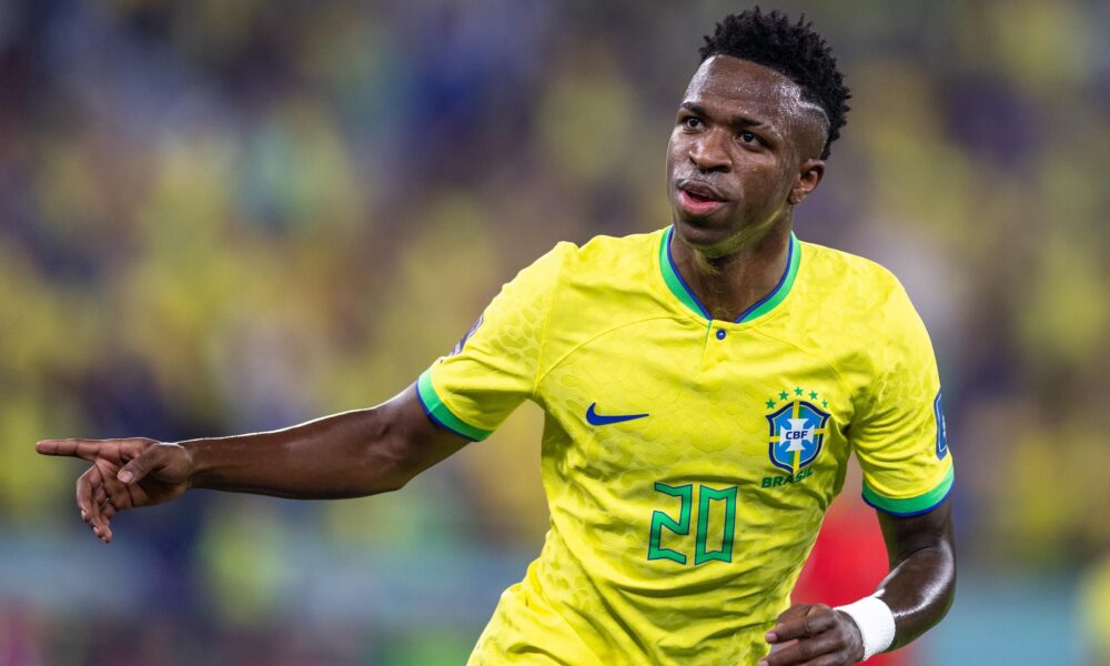 Vinicius Junior celebrating a goal for Brazil during an international match.