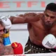 Anthony Joshua delivers a knockout punch to Jake Paul during their six-round boxing match at Miami’s Kaseya Center.