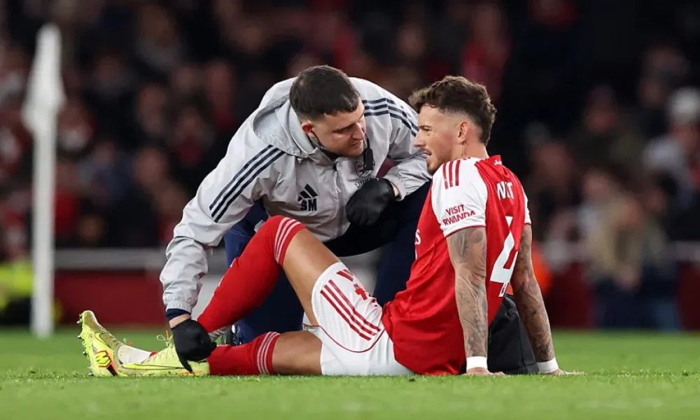 Ben White receiving treatment during Arsenal vs Wolves at the Emirates Stadium