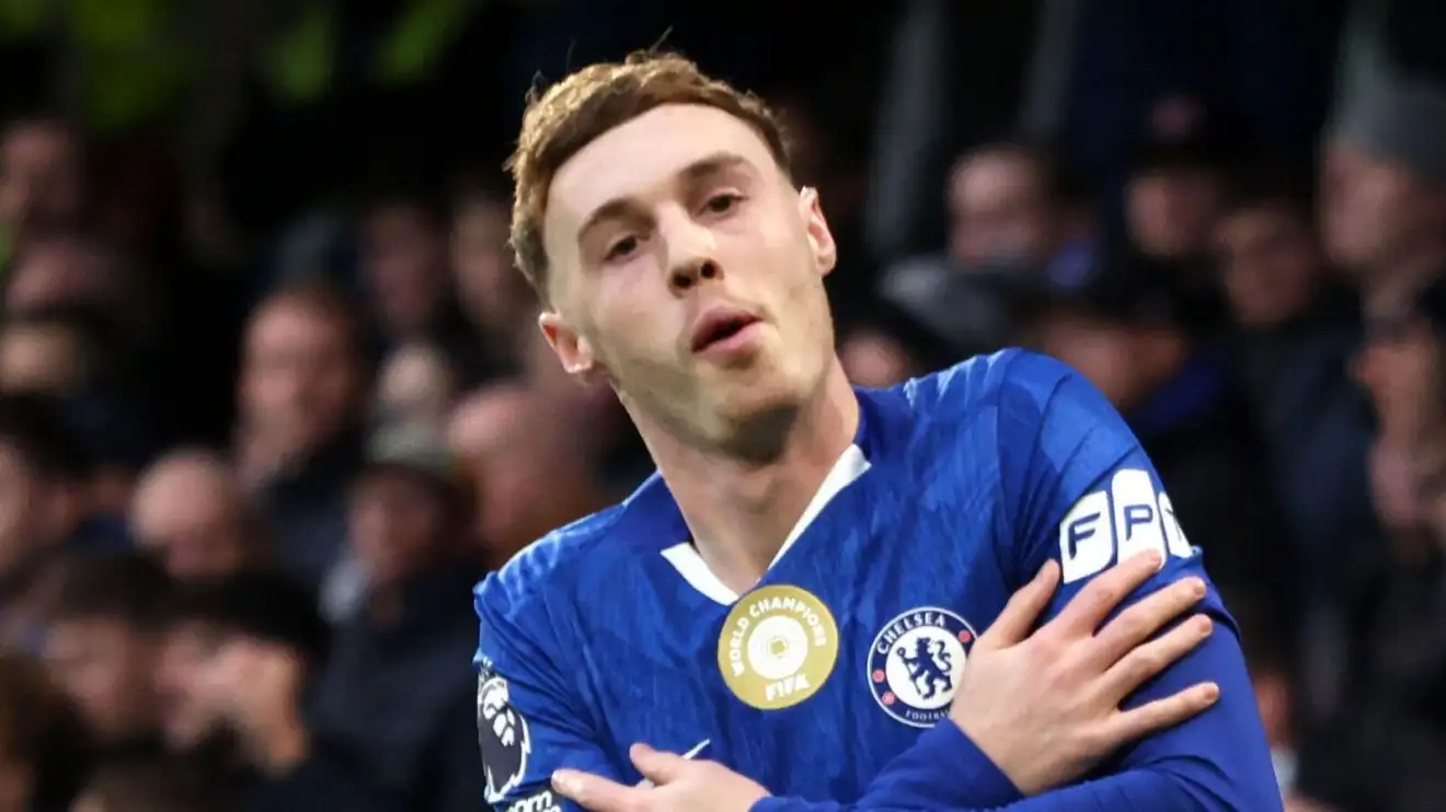 Cole Palmer celebrating a goal for Chelsea at Stamford Bridge against Everton