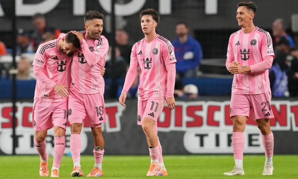 Inter Miami players wearing the pink home kit during an MLS match.