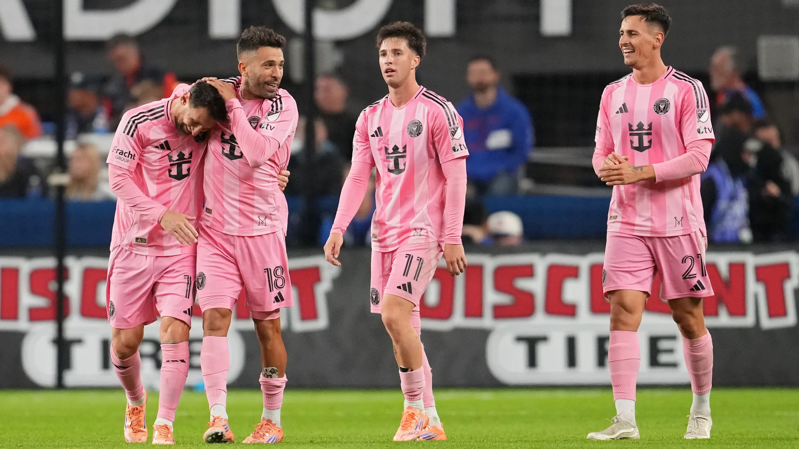 Inter Miami players wearing the pink home kit during an MLS match.