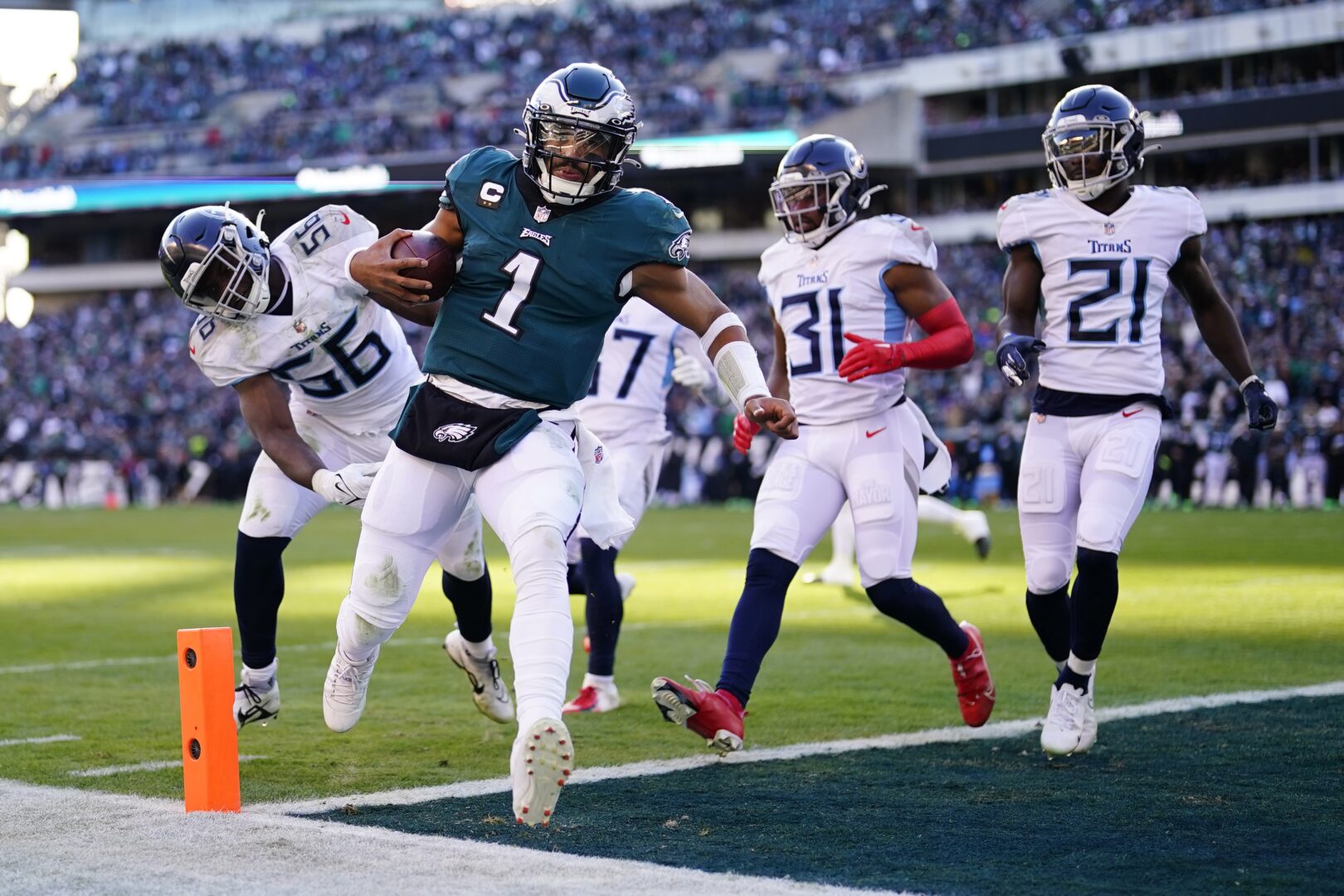 Jalen Hurts attempting a pass during an NFL game for the Philadelphia Eagles.