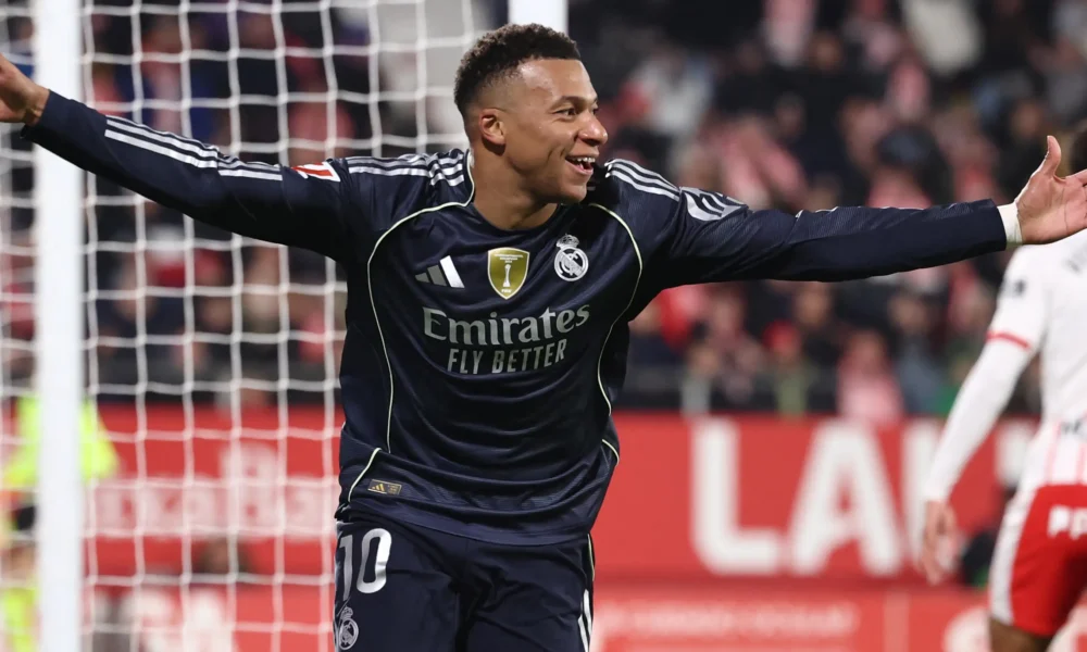 Kylian Mbappe celebrating a goal for Real Madrid, marking his 60th goal in 2025.