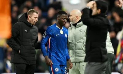 Moises Caicedo walking off the pitch after receiving a red card against Arsenal