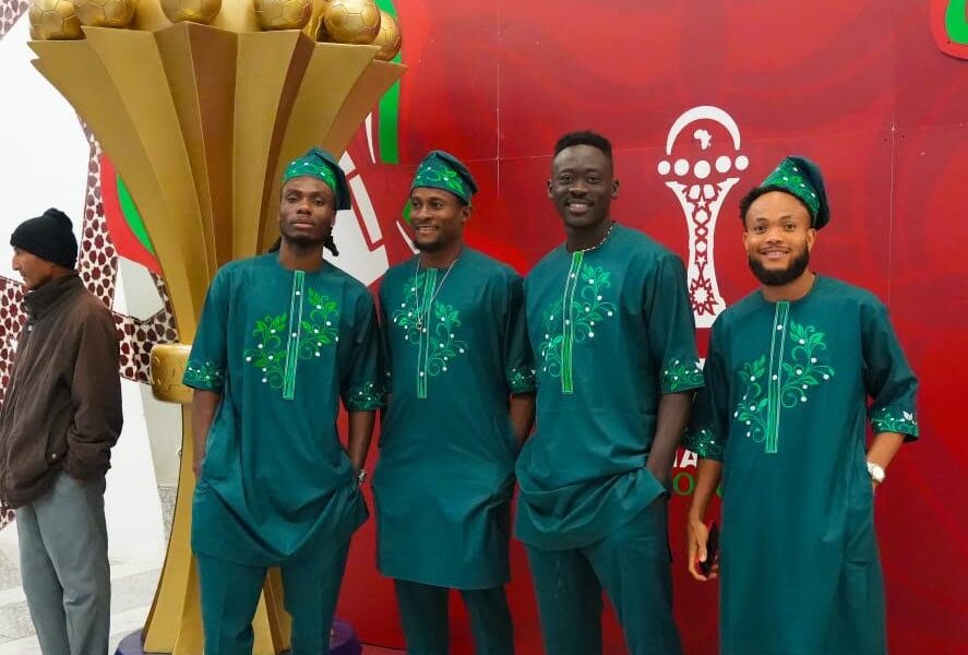 Super Eagles Of Nigeria Arriving In Morocco Wearing Traditional Green Senator Outfits At AFCON 2025