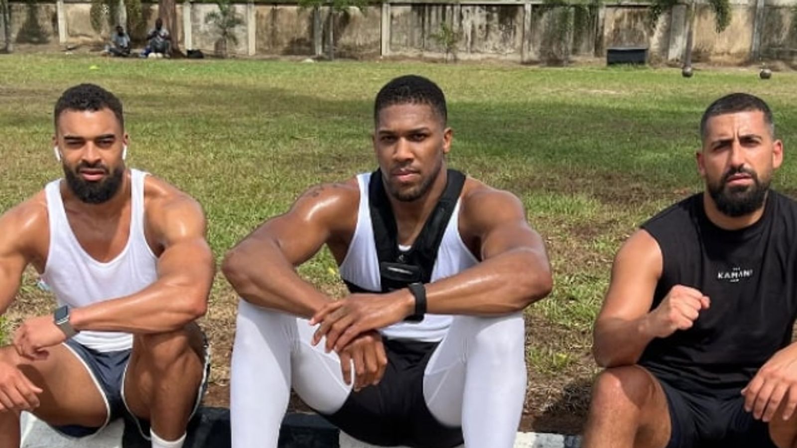Anthony Joshua looking somber during public appearance following team tragedy
