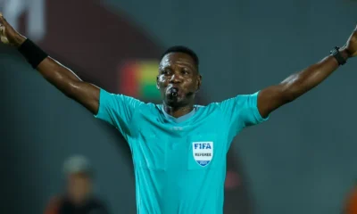Ghanaian referee Daniel Laryea overseeing a football match, appointed for Nigeria vs Morocco AFCON 2025 semi-final