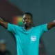 Ghanaian referee Daniel Laryea overseeing a football match, appointed for Nigeria vs Morocco AFCON 2025 semi-final