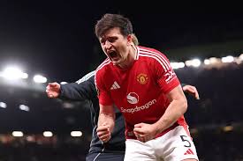 Harry Maguire celebrating during Manchester United victory at Old Trafford