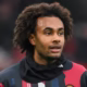 Joshua Zirkzee frustrated on the sidelines during Manchester United match