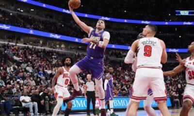 Luka Doncic celebrates after scoring against the Chicago Bulls for the Los Angeles Lakers