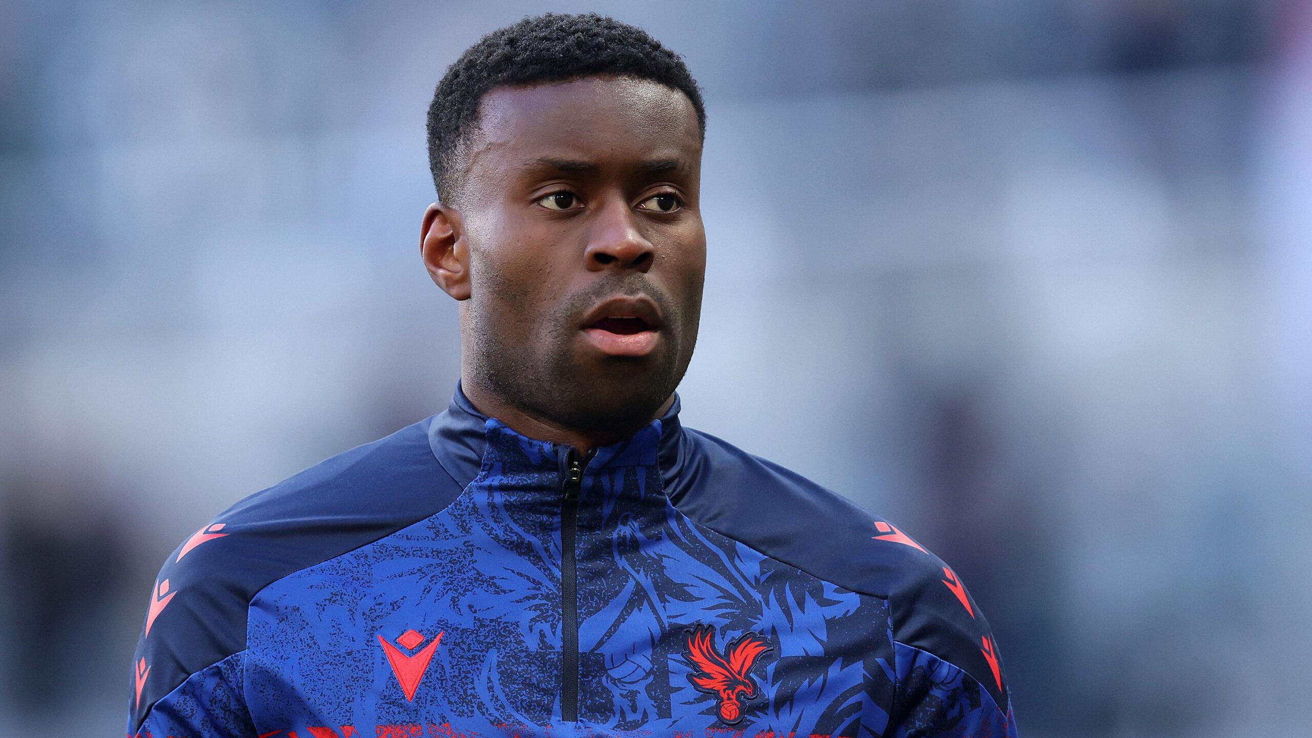 Marc Guehi warming up for Crystal Palace amid Manchester City transfer links