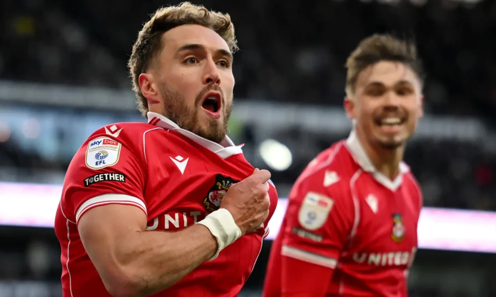 Matty James celebrates stunning goal for Wrexham against Derby in Championship clash