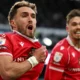 Matty James celebrates stunning goal for Wrexham against Derby in Championship clash
