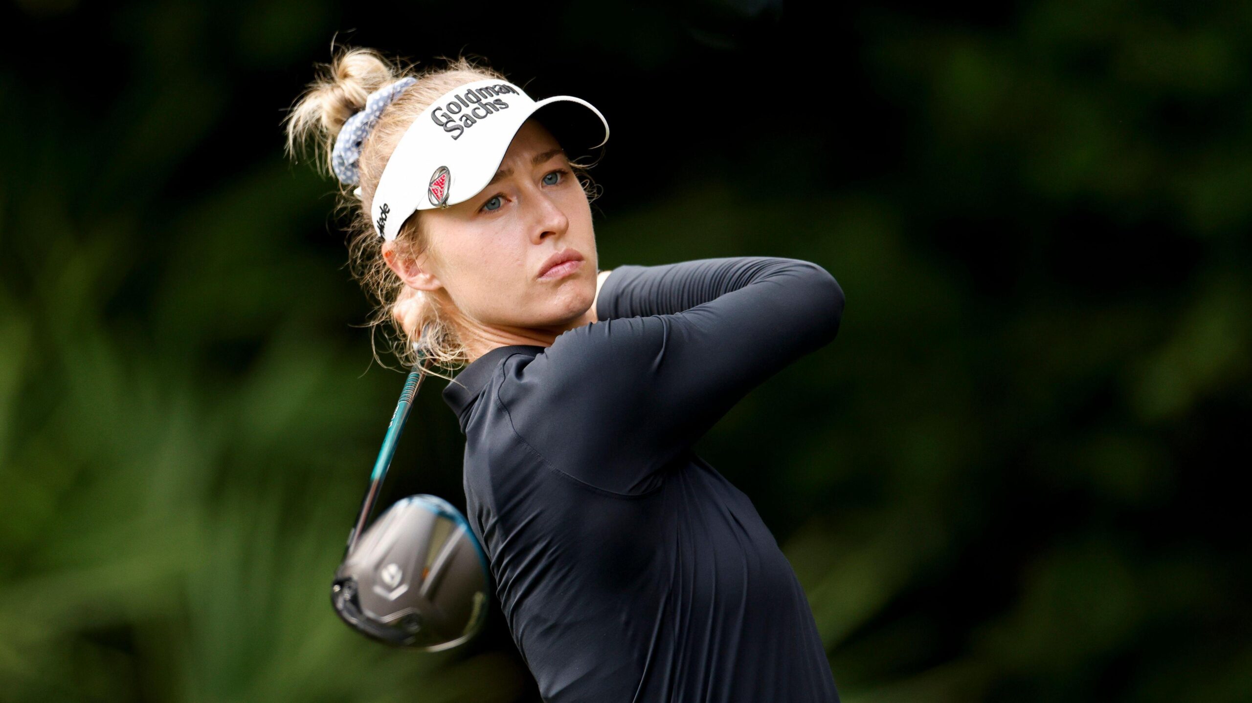 Nelly Korda speaking at an LPGA event about mixed-gender golf opportunities