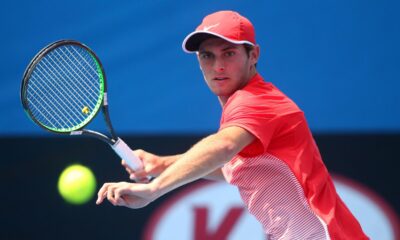 Oliver Anderson playing a professional tennis match after returning from suspension