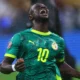 Senegal players celebrating AFCON 2025 title after dramatic final against Morocco