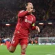 Virgil van Dijk celebrating during Liverpool’s Champions League win at Anfield